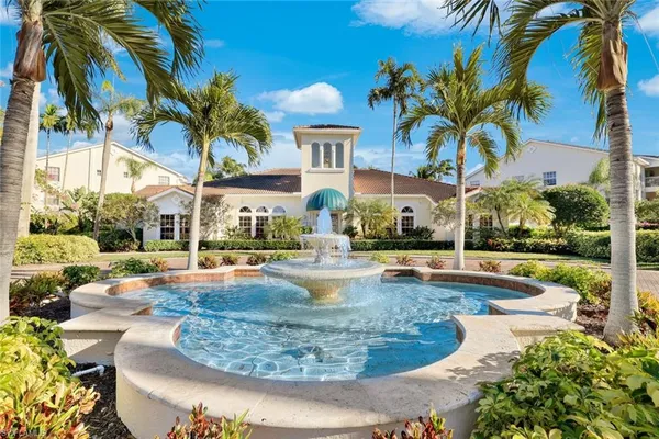 a view of a house with swimming pool and porch