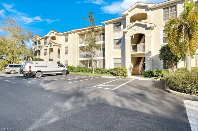 a view of a chairs and table in patio