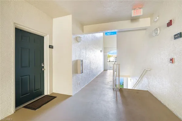 a view of a hallway with elevator