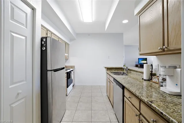 a living room with furniture a dining table and chairs