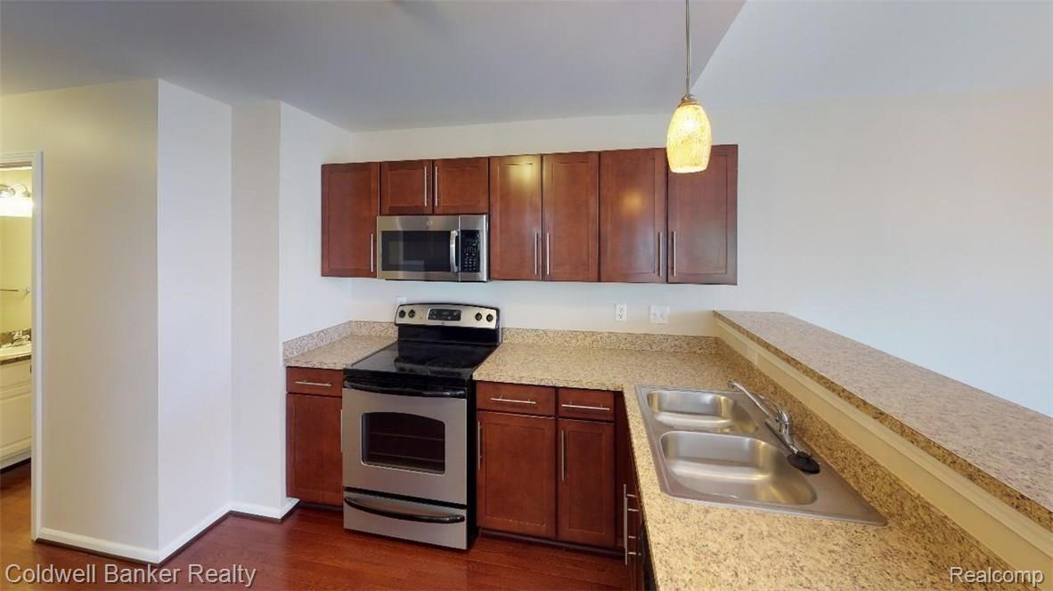 49036 Hawksburry Road, Unit 1115 Canton, MI 48188 - Photo 6 of 20 FJbjmcusnnW - Kitchen(1).jpg