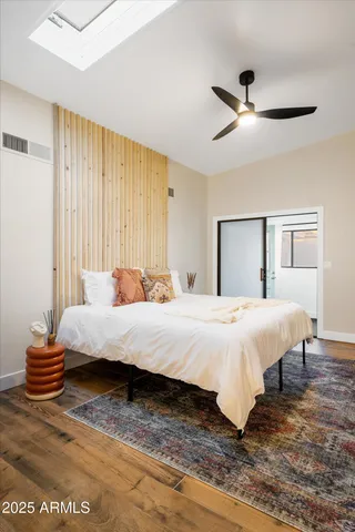 a large white bed in a white room