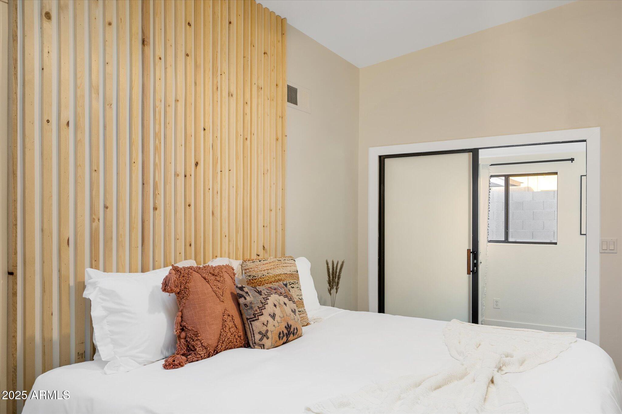 2307 North 51st Place Phoenix, AZ 85008 - Photo 28 of 41 a large white bed in a white room