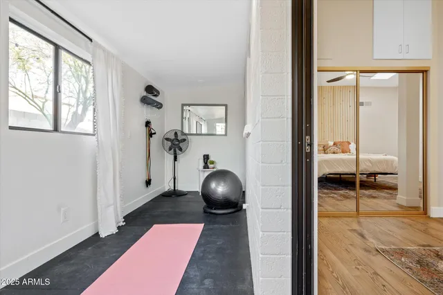 a view of a patio with couple of chairs