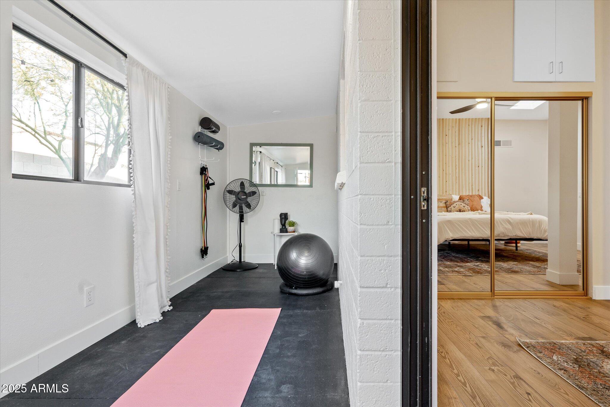 2307 North 51st Place Phoenix, AZ 85008 - Photo 33 of 41 a bedroom with a bed and a window
