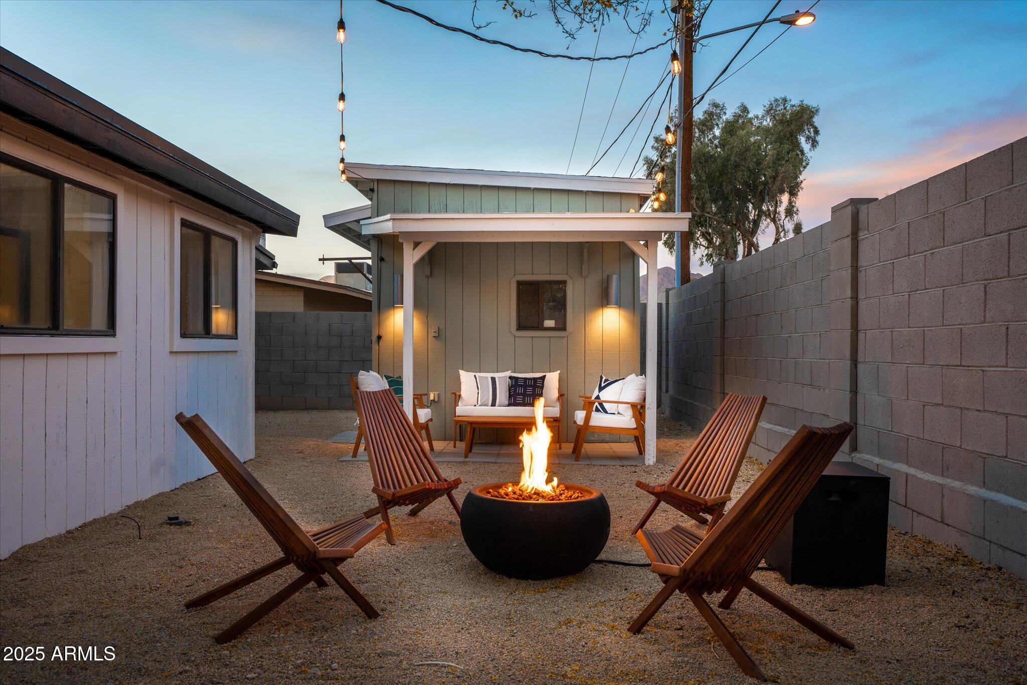 2307 North 51st Place Phoenix, AZ 85008 - Photo 34 of 41 a view of a patio with couple of chairs