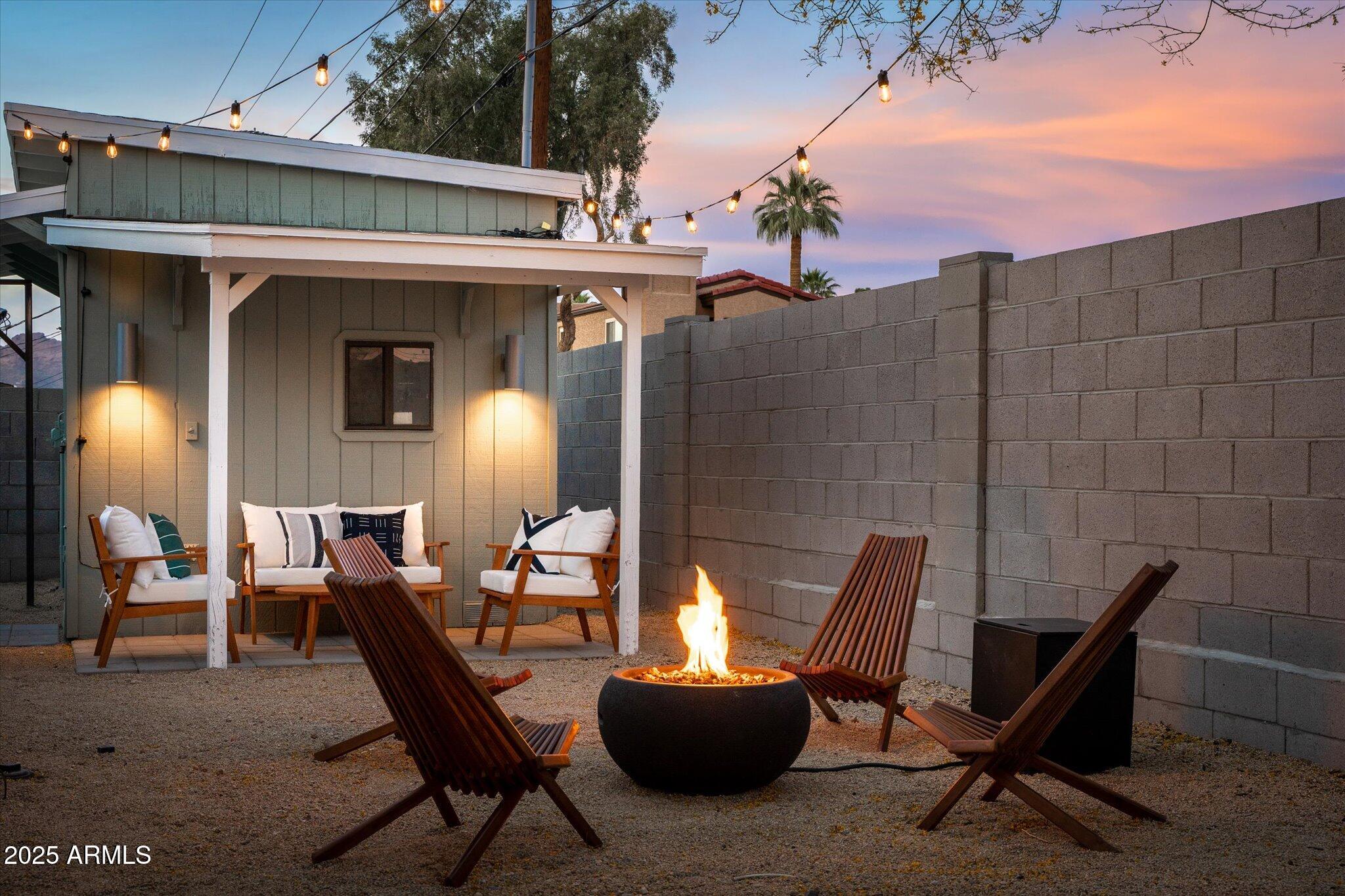 2307 North 51st Place Phoenix, AZ 85008 - Photo 35 of 41 a patio with table and chairs