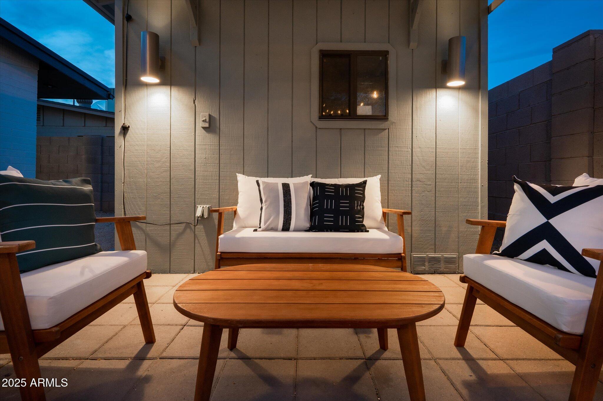2307 North 51st Place Phoenix, AZ 85008 - Photo 37 of 41 a view of a livingroom with furniture and a flat screen tv