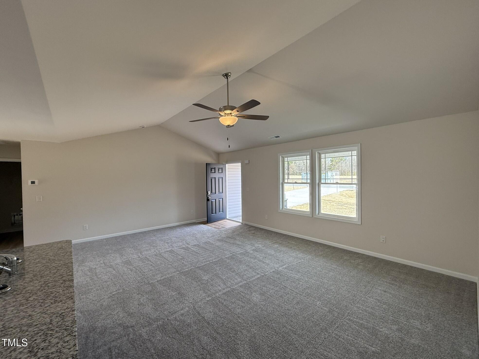 73 Phil Jack Road Dunn, NC 28334 - Photo 4 of 17 a view of an empty room with a window