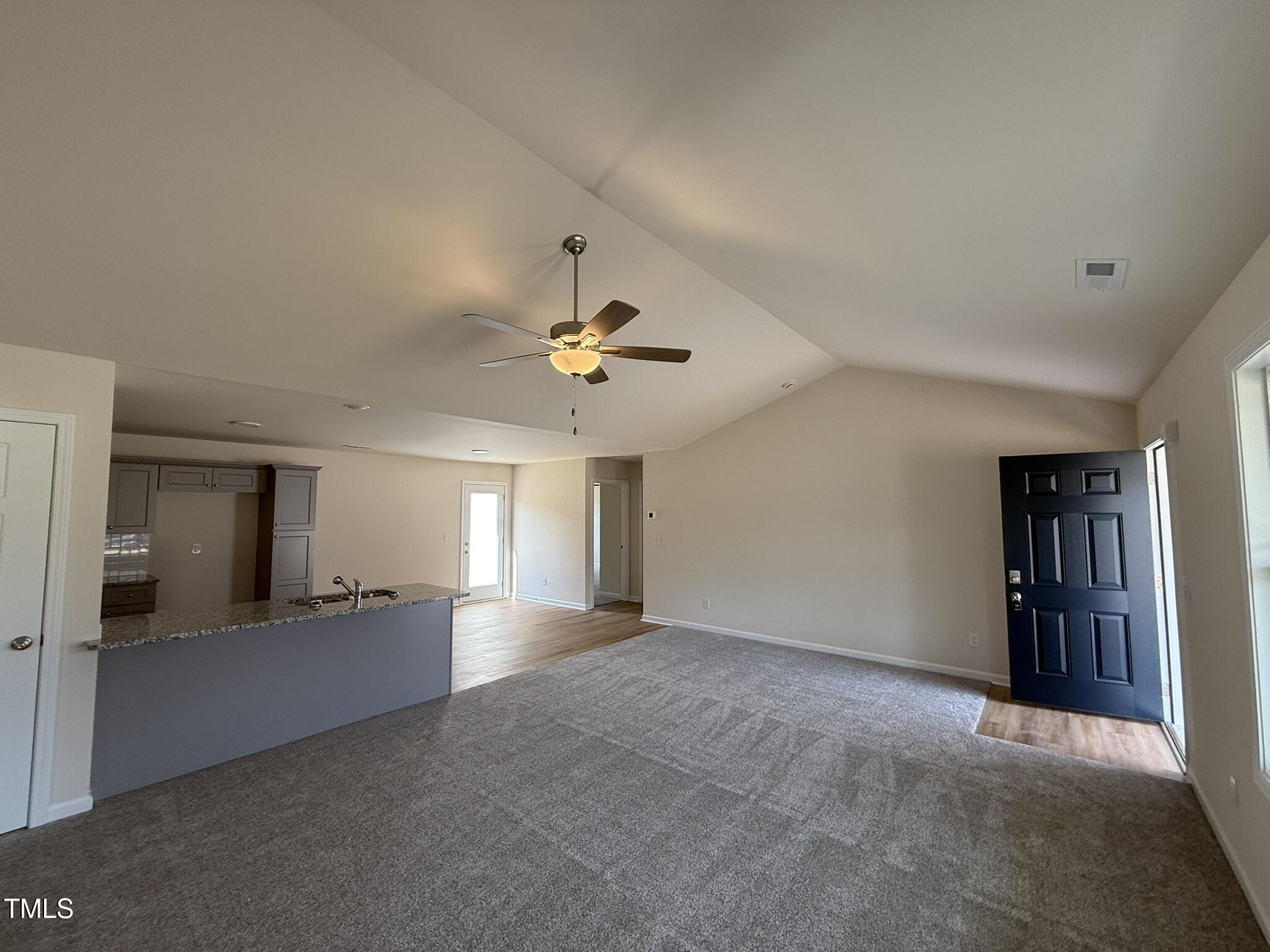 73 Phil Jack Road Dunn, NC 28334 - Photo 5 of 17 a view of an empty room with window and cabinet