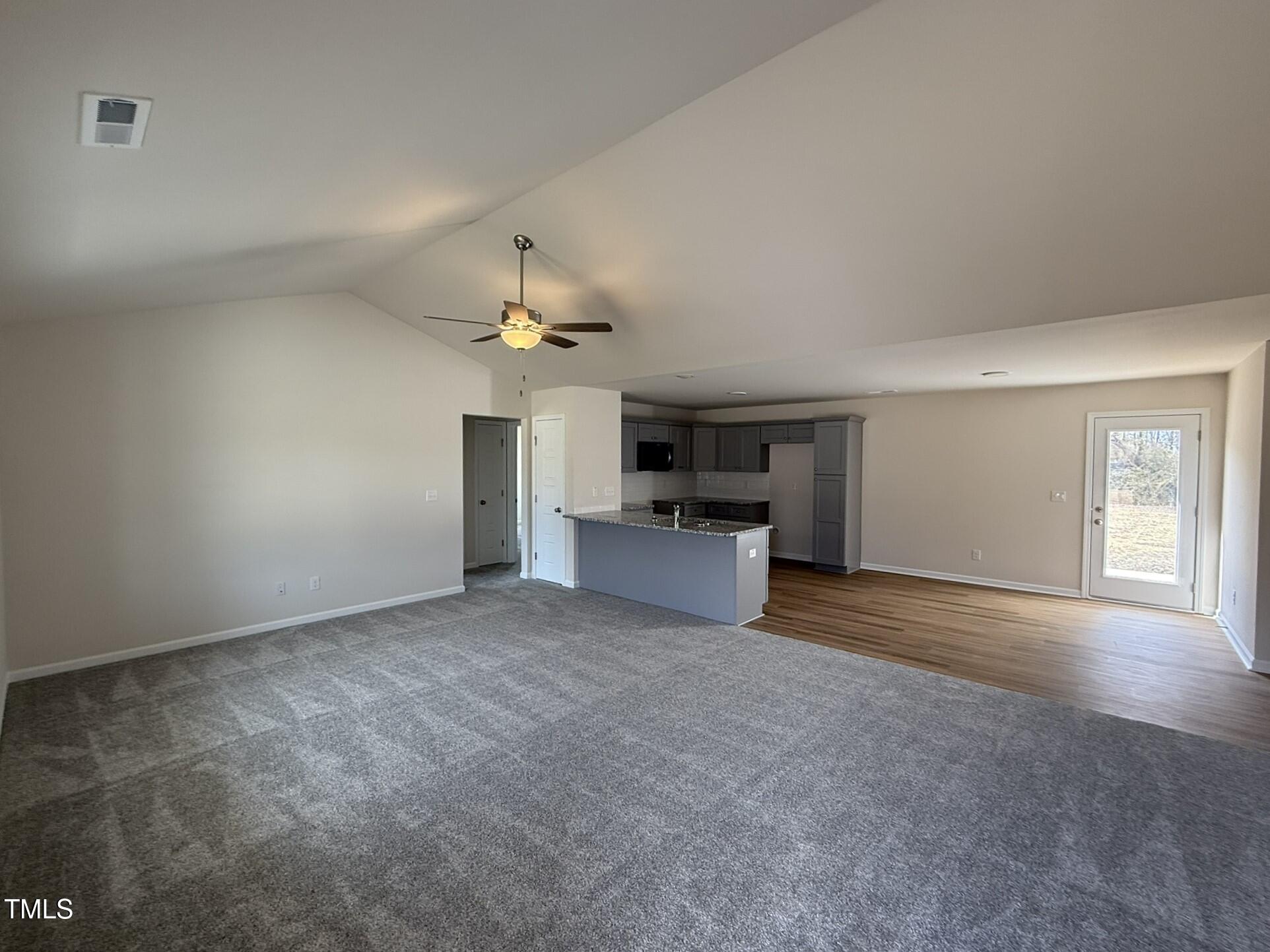 73 Phil Jack Road Dunn, NC 28334 - Photo 6 of 17 a view of a kitchen with a sink cabinets and a kitchen counter space