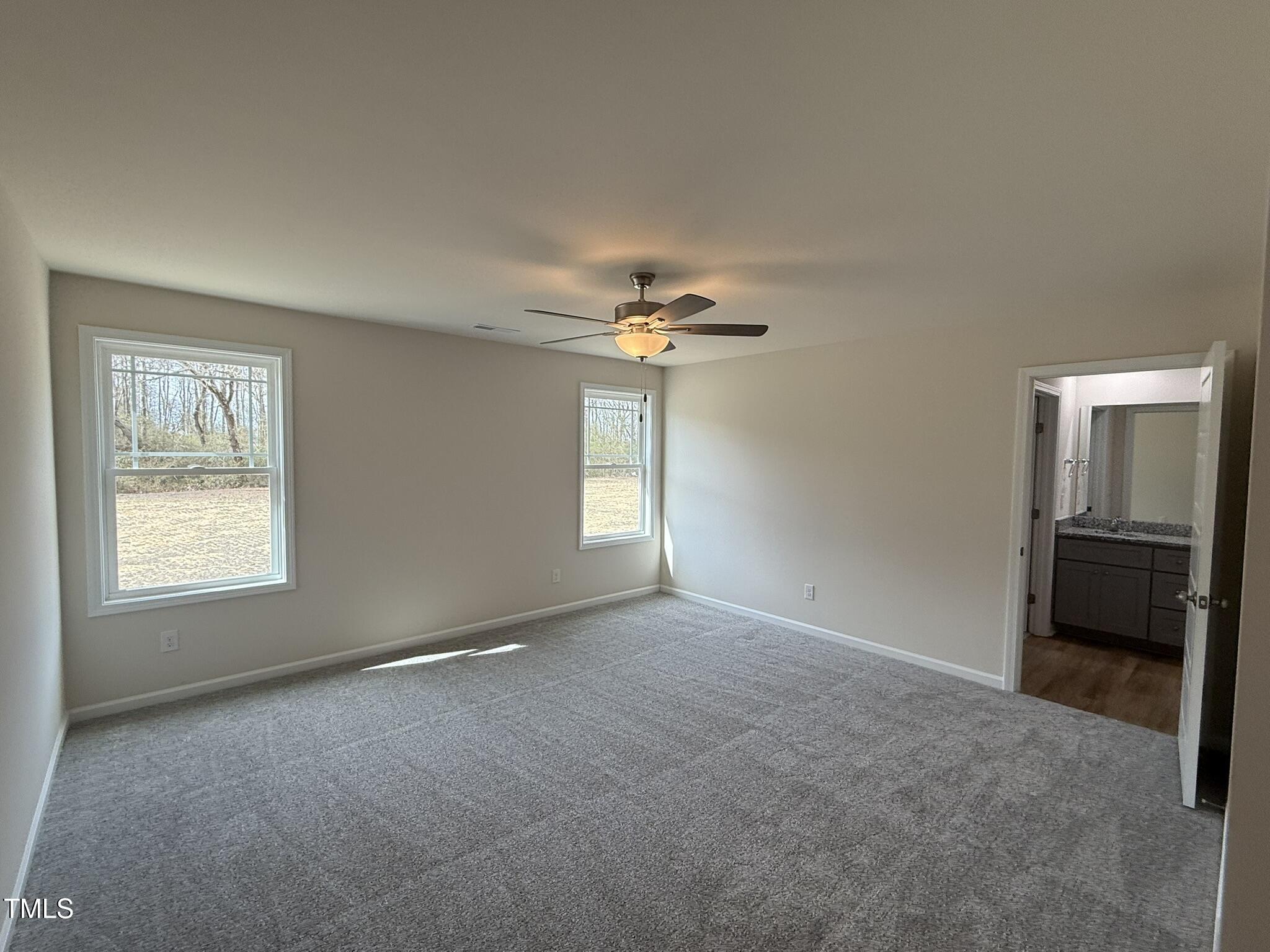 73 Phil Jack Road Dunn, NC 28334 - Photo 9 of 17 a view of an empty room with a window