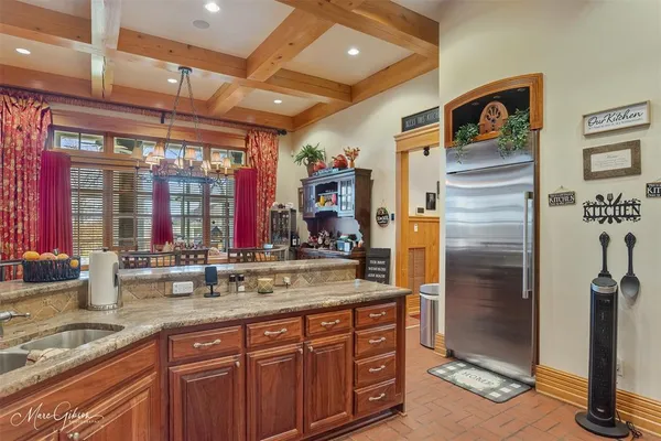 a bathroom with double vanity and a sink