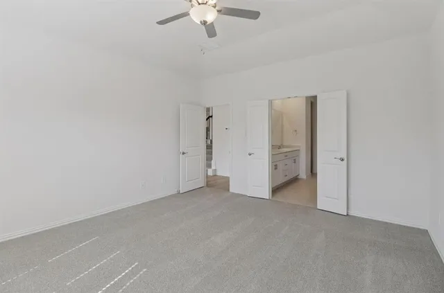 an empty room with a bathroom