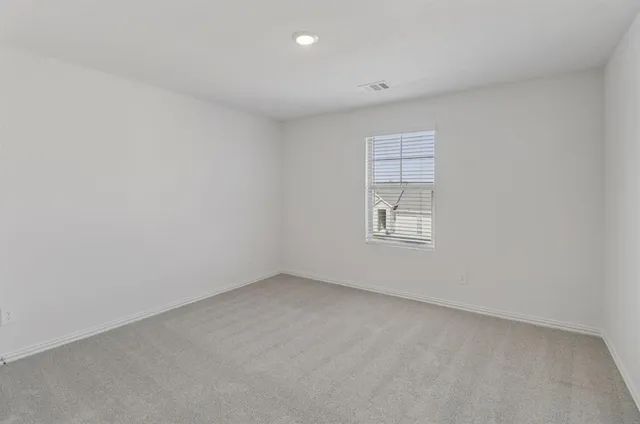 a bathroom with a double vanity sink and mirror