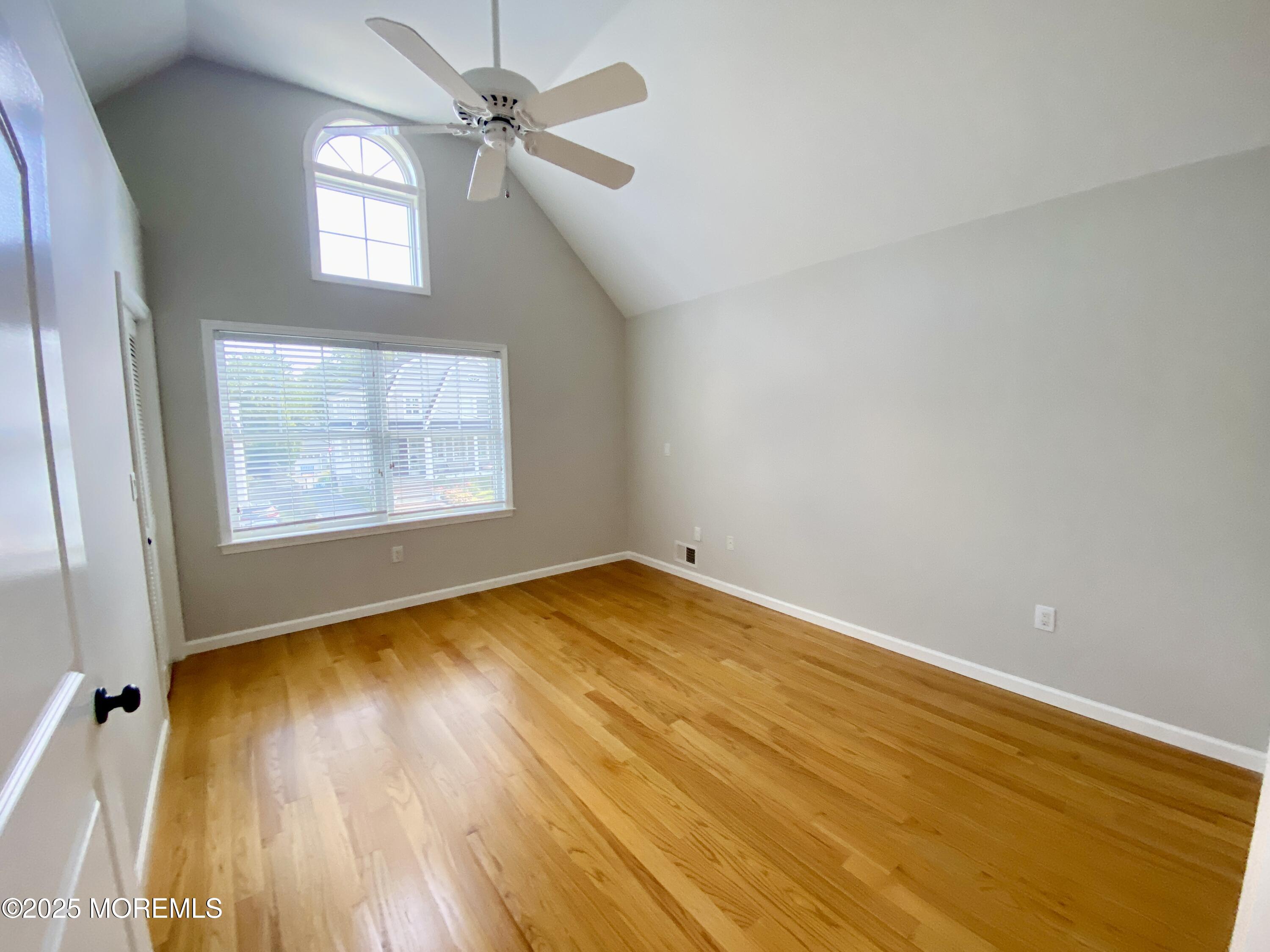 32 1st Street Rumson, NJ 07760 - Photo 13 of 25 wooden floor in an empty room with a window