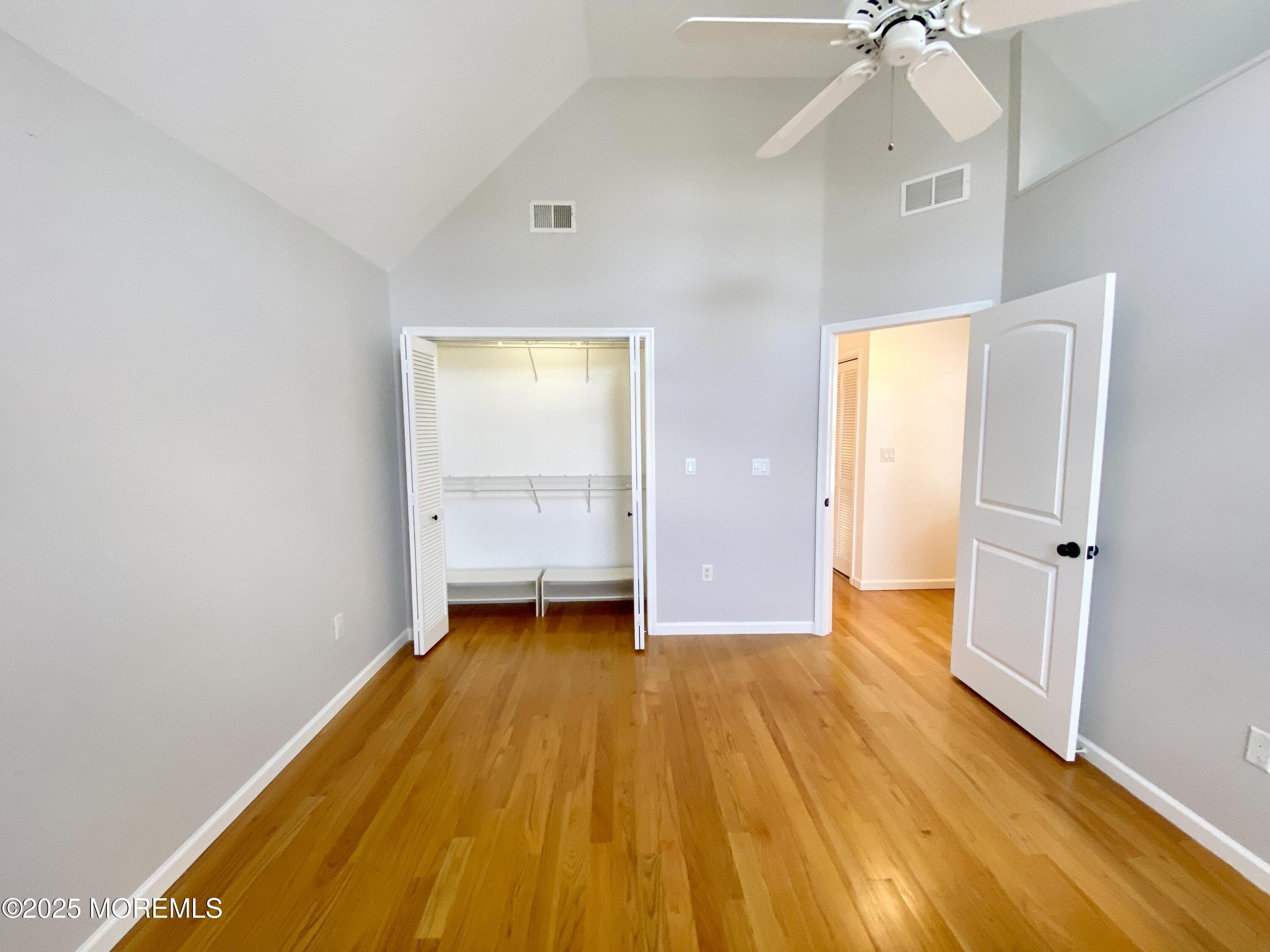 32 1st Street Rumson, NJ 07760 - Photo 15 of 25 wooden floor in an empty room with a window