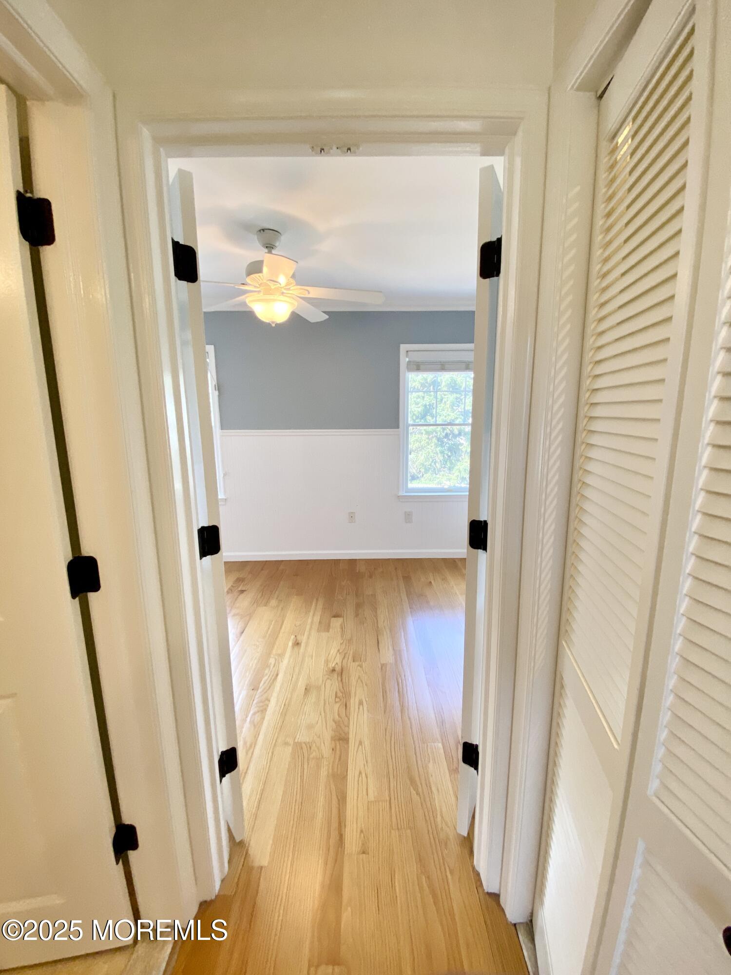 32 1st Street Rumson, NJ 07760 - Photo 19 of 25 a view of a hallway with wooden floor and stairs