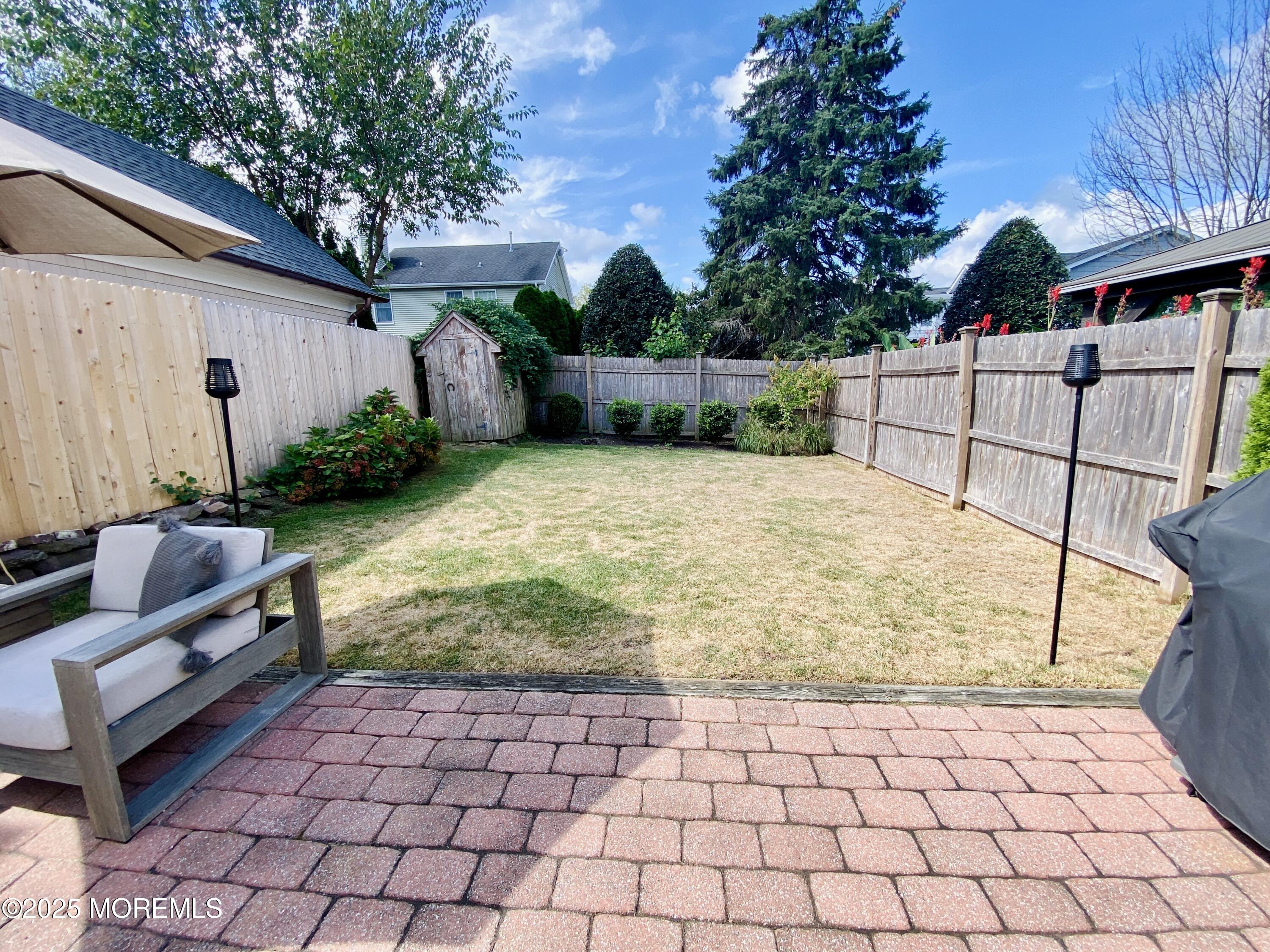 32 1st Street Rumson, NJ 07760 - Photo 25 of 25 a view of backyard with sitting area