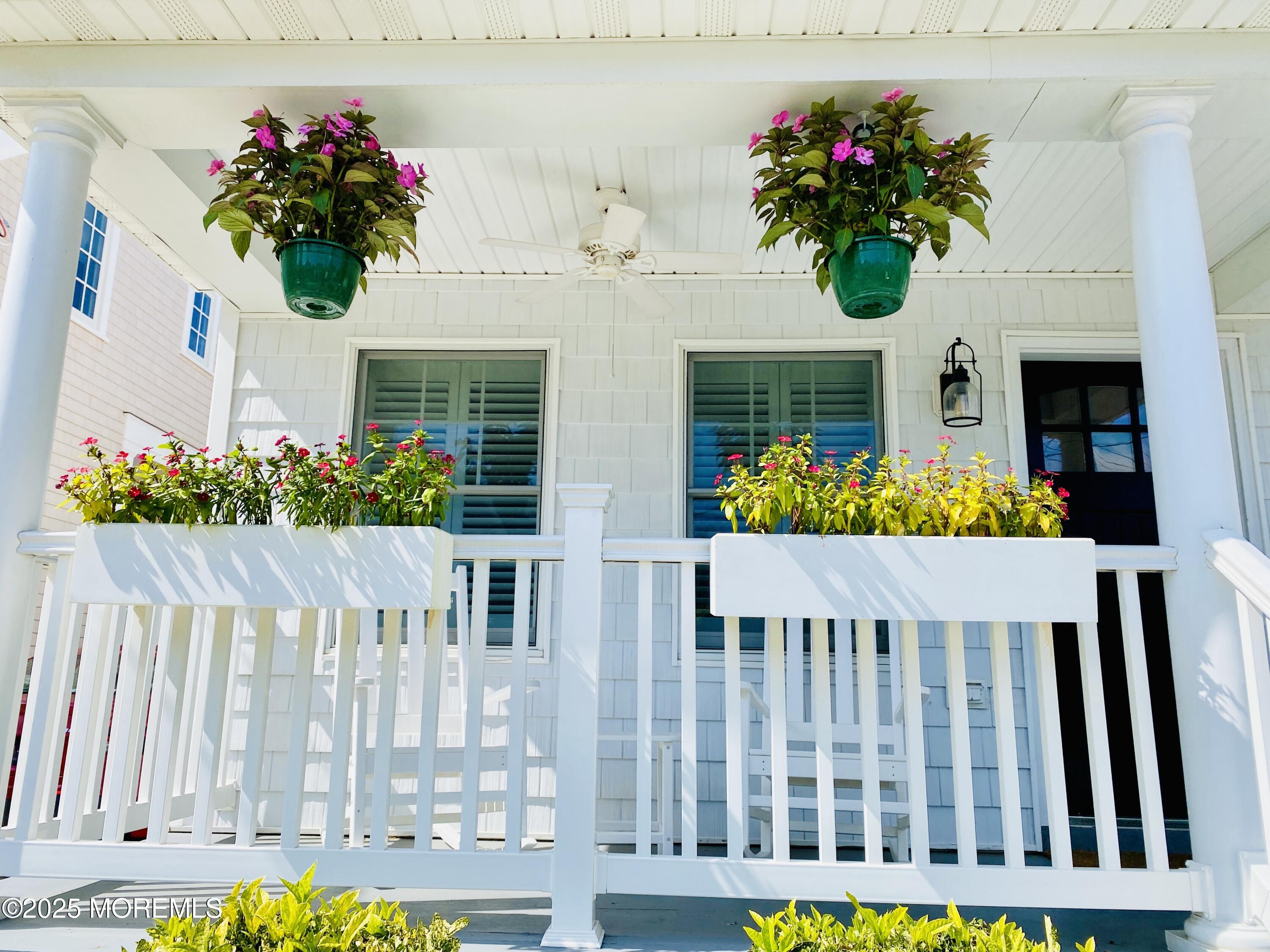 32 1st Street Rumson, NJ 07760 - Photo 3 of 25 a vase of flowers sitting on a table