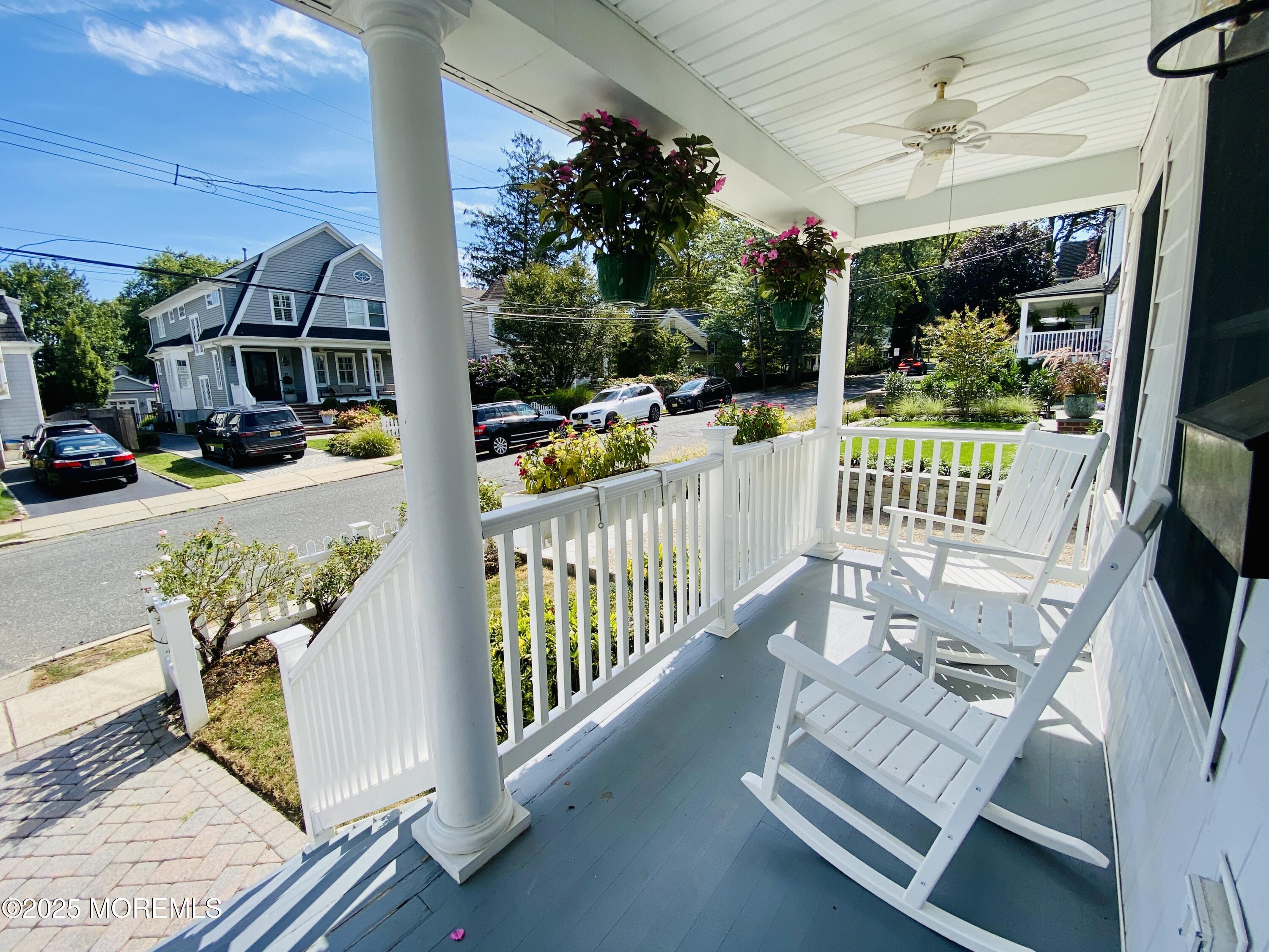 32 1st Street Rumson, NJ 07760 - Photo 4 of 25 a view of a porch with chairs and porch
