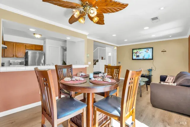 a view of a dining room with furniture