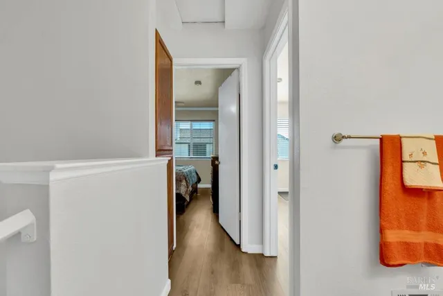 a view of a bedroom from a hallway