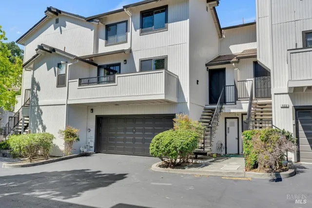 front view of a house with a street