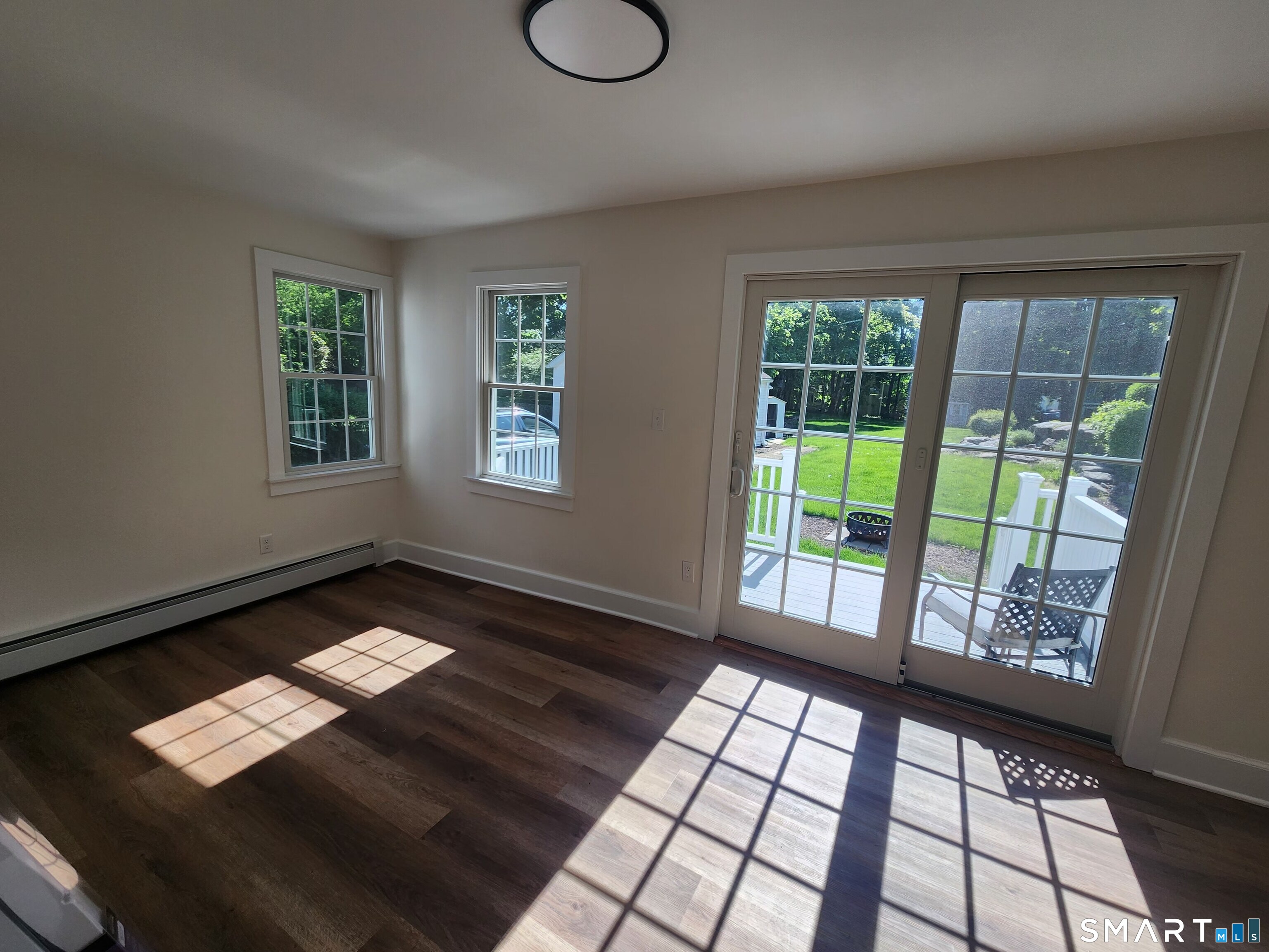 82 State Street, Unit 1 Guilford, CT 06437 - Photo 7 of 9 a view of an empty room with a window