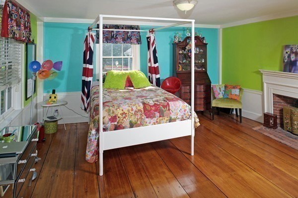 269 High Street Hingham, MA 02043 - Photo 20 of 29 a bedroom with a bed and a wooden floor