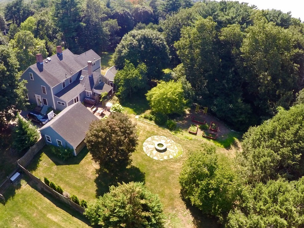 269 High Street Hingham, MA 02043 - Photo 2 of 29 an aerial view of a house with a yard and garden