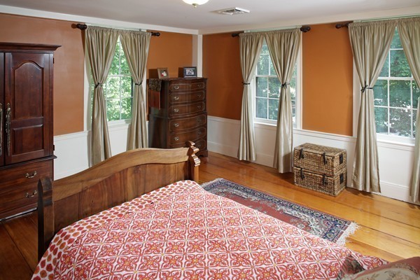269 High Street Hingham, MA 02043 - Photo 21 of 29 a bedroom with a bed and wooden floor