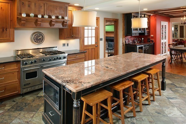 269 High Street Hingham, MA 02043 - Photo 7 of 29 a kitchen with a stove a sink and a refrigerator