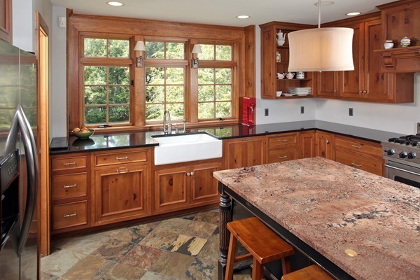 269 High Street Hingham, MA 02043 - Photo 8 of 29 a kitchen with stainless steel appliances granite countertop a stove a sink and a microwave