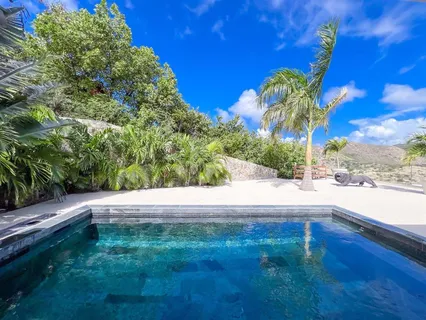 a view of a living room and dining room
