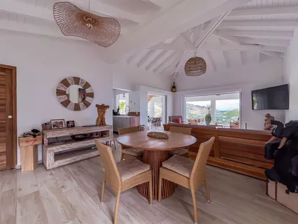 a outdoor living space with furniture and a floor to ceiling window