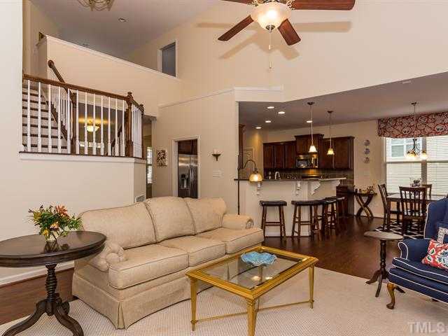 2903 Red Grape Drive Raleigh, NC 27607 - Photo 12 of 25 a living room with furniture kitchen view and a potted plant