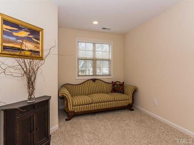 2903 Red Grape Drive Raleigh, NC 27607 - Photo 17 of 25 a living room with furniture and a window