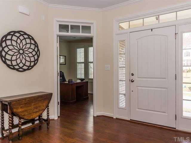 2903 Red Grape Drive Raleigh, NC 27607 - Photo 2 of 25 a living room with furniture and a wooden floor