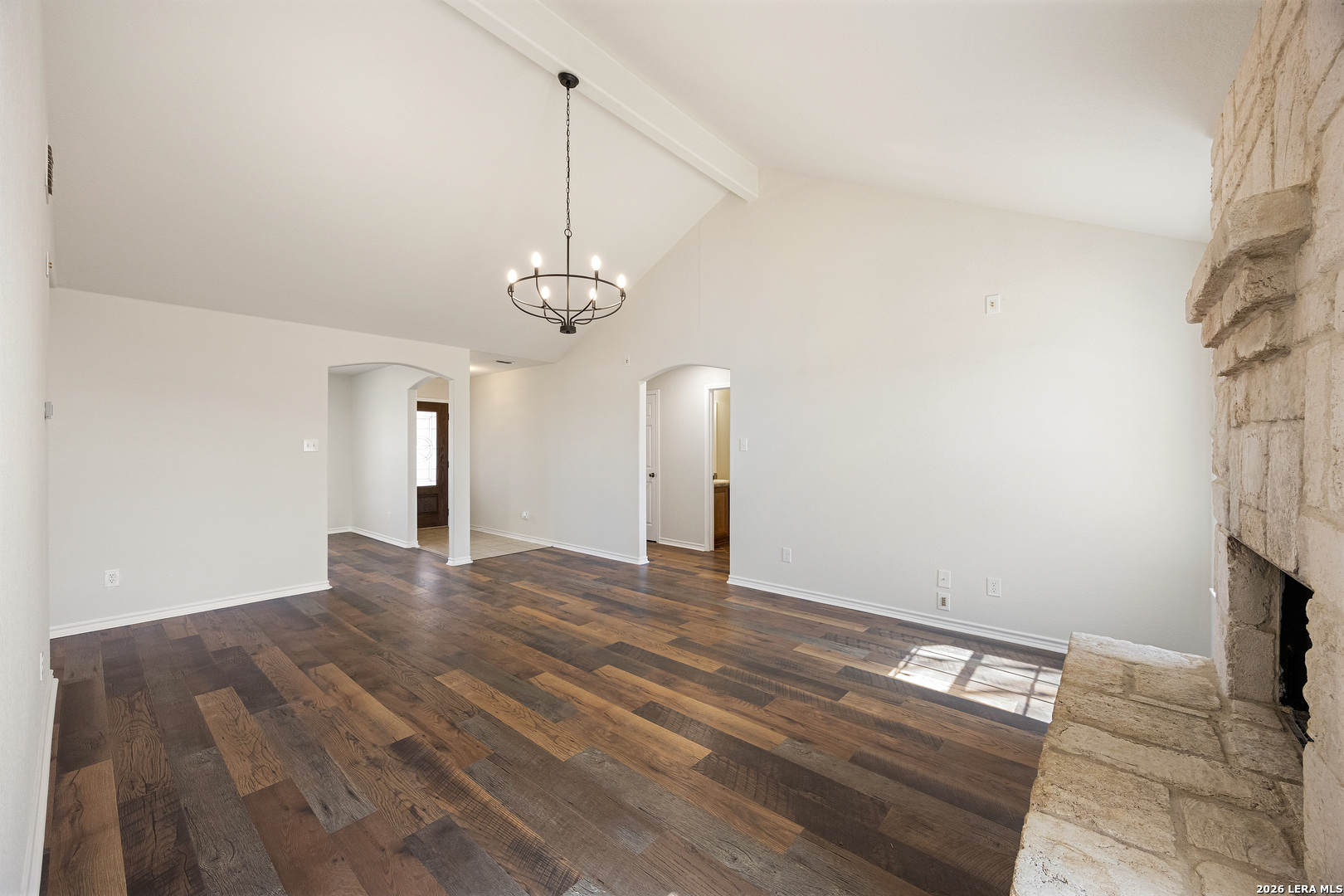 18181 Senior Road Von Ormy, TX 78073 - Photo 12 of 46 a view of empty room with fireplace and fan
