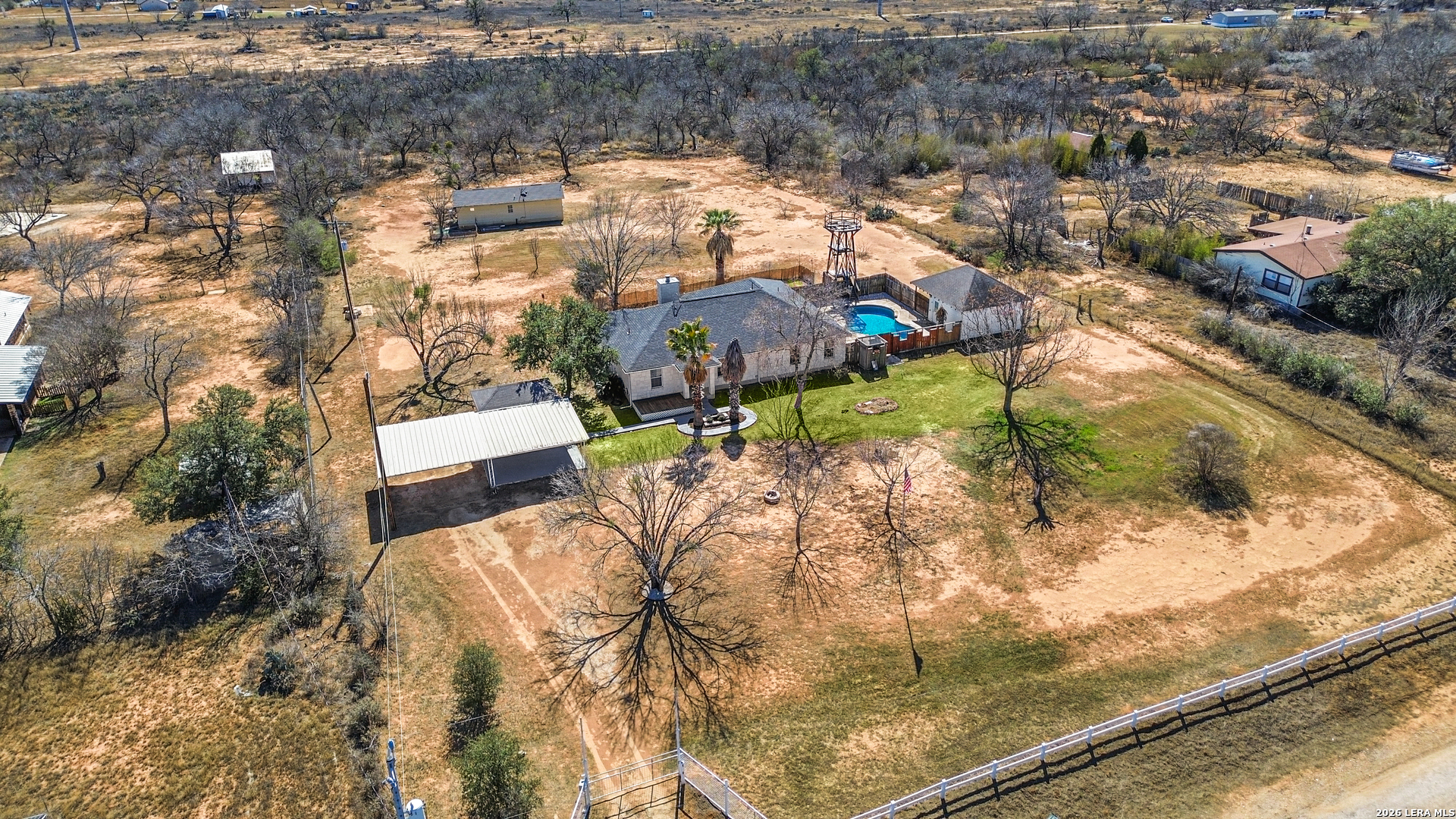 18181 Senior Road Von Ormy, TX 78073 - Photo 41 of 46 a view of swimming pool with a yard and lake view