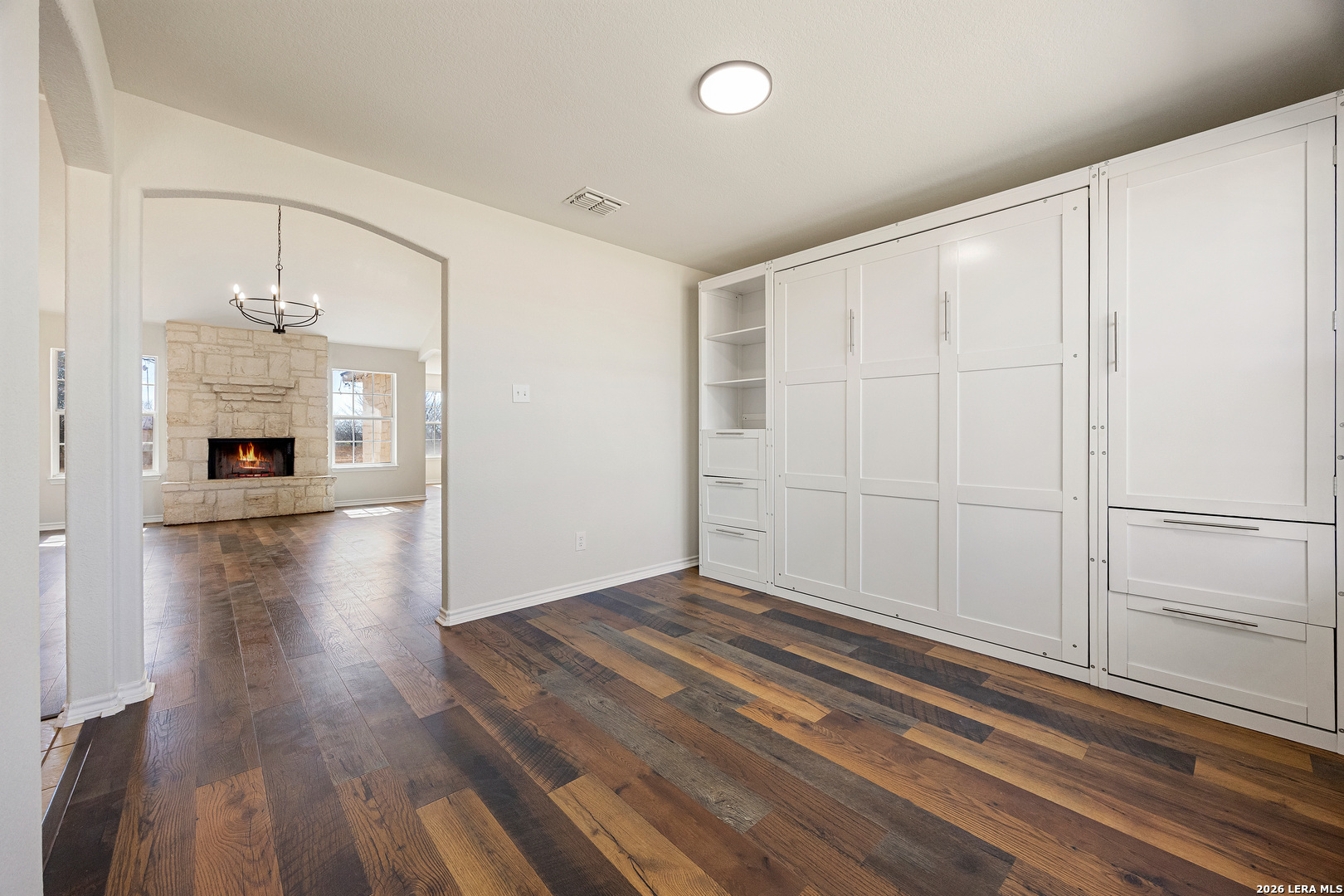 18181 Senior Road Von Ormy, TX 78073 - Photo 9 of 46 a view of empty room with wooden floor