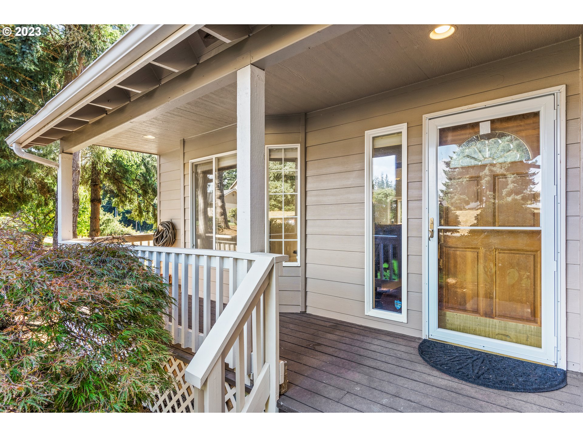 5963 Timber Ridge Drive Southeast Salem, OR 97317 - Photo 13 of 39 a view of porch with wooden floor and outdoor seating