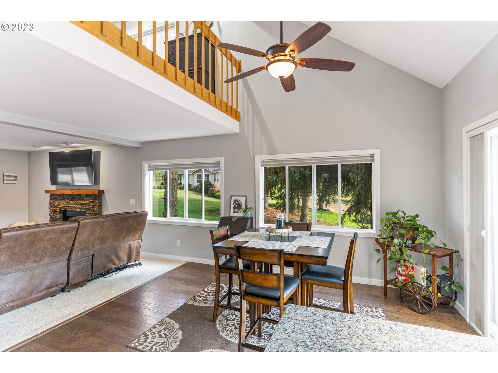 5963 Timber Ridge Drive Southeast Salem, OR 97317 - Photo 17 of 39 a living room with furniture and a large window