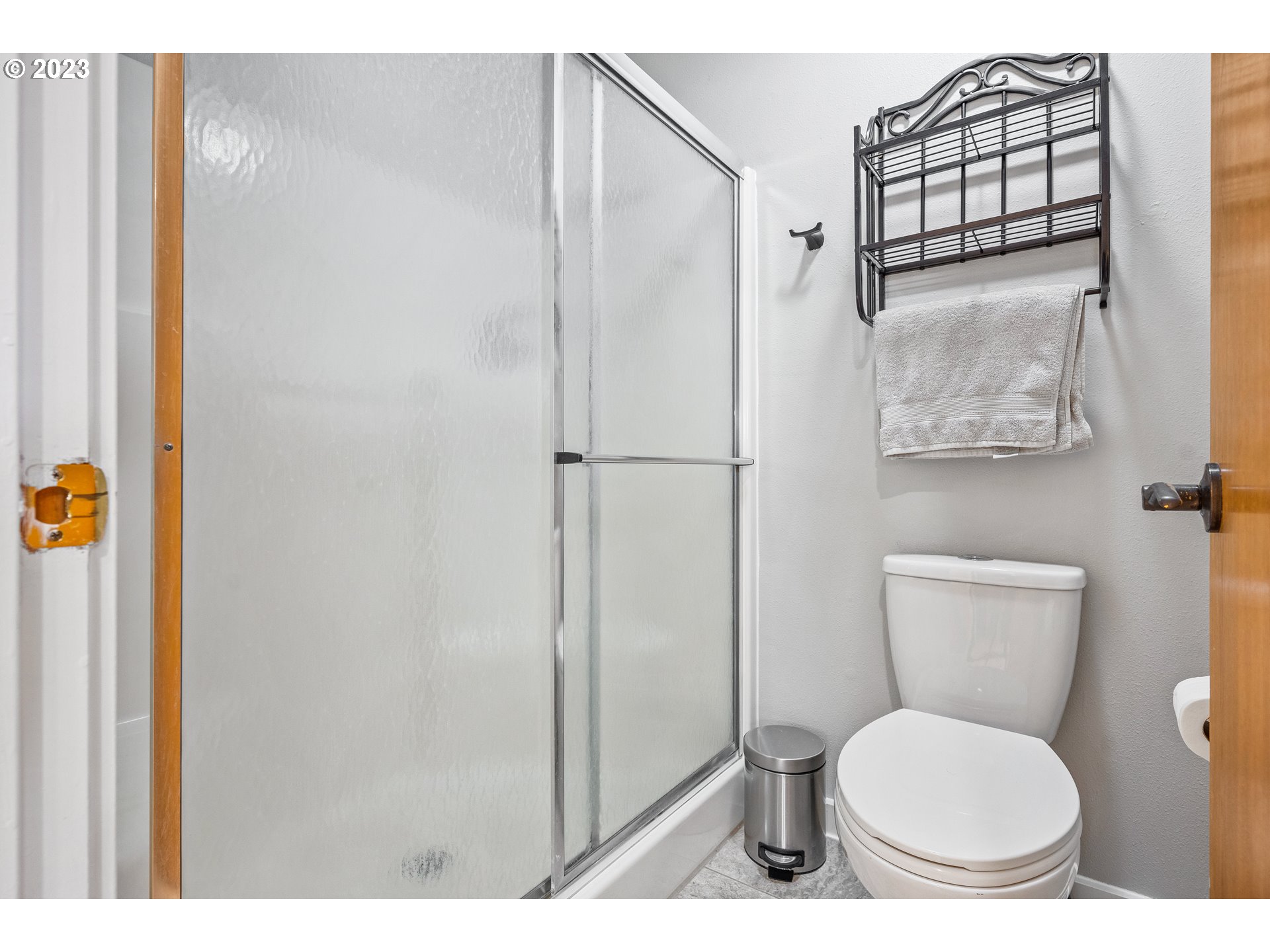 5963 Timber Ridge Drive Southeast Salem, OR 97317 - Photo 31 of 39 a bathroom with a toilet and a shower
