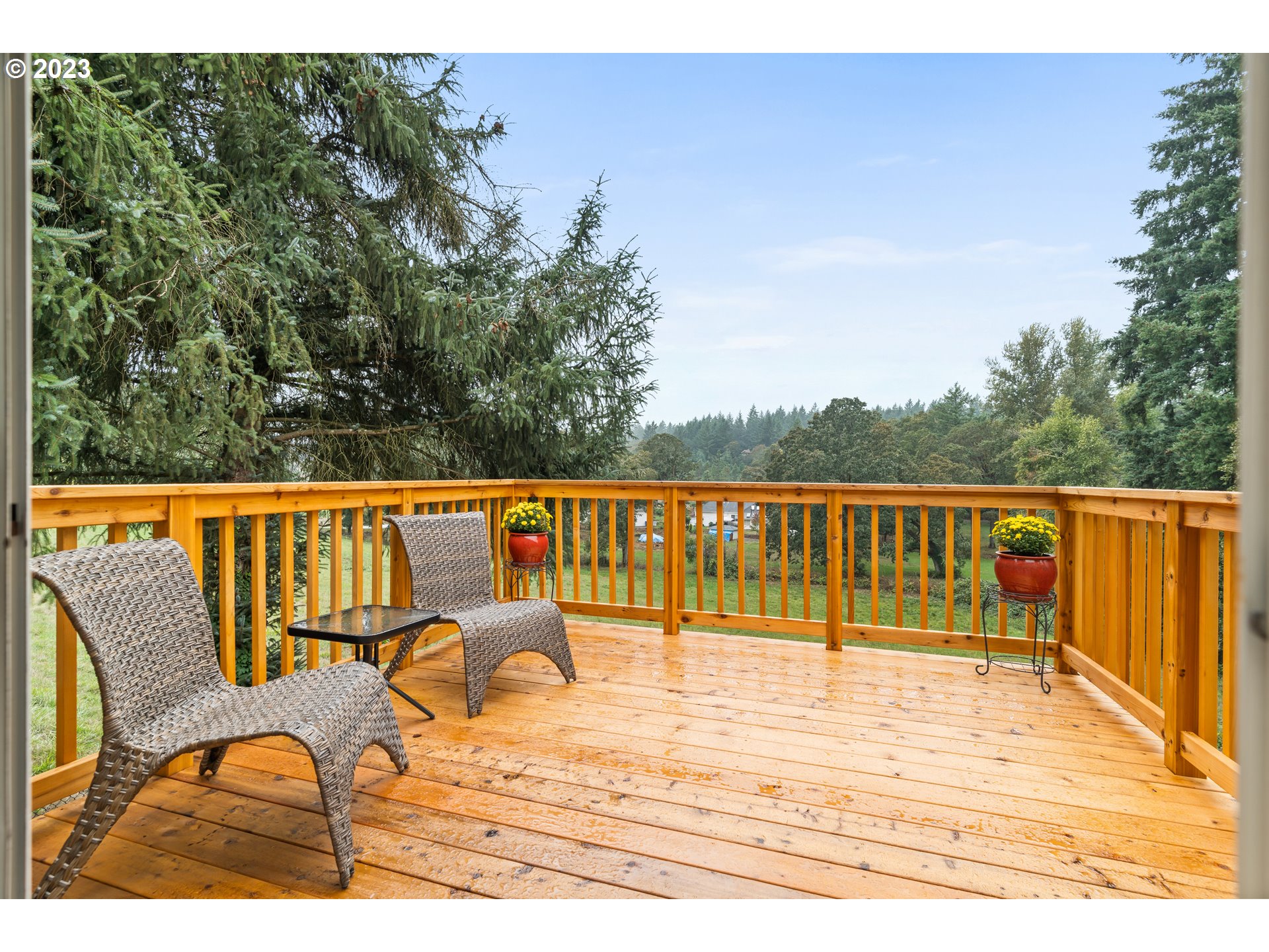 5963 Timber Ridge Drive Southeast Salem, OR 97317 - Photo 9 of 39 a balcony with wooden floor and fence
