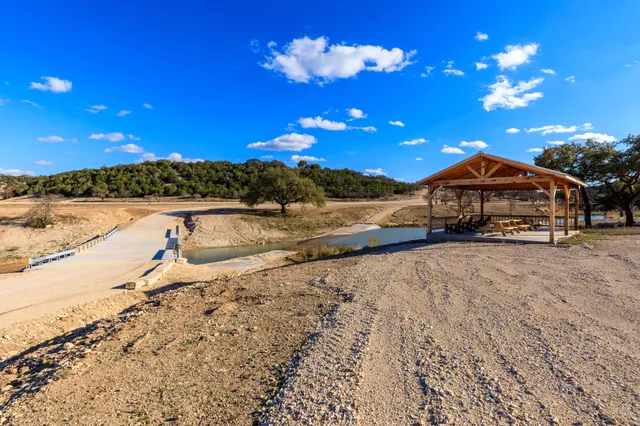 a view of a lake and a yard