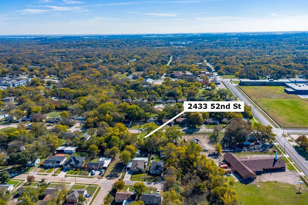2433 52nd Street Dallas, TX 75216 - Photo 14 of 15 an aerial view of residential houses with outdoor space