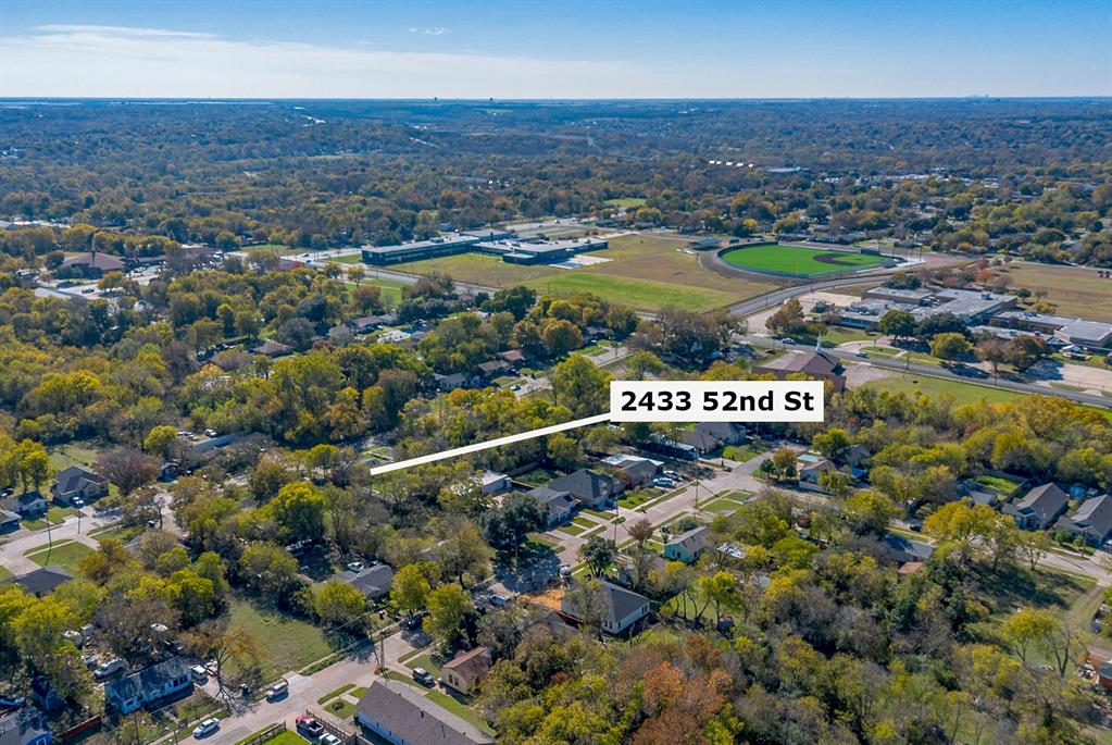 2433 52nd Street Dallas, TX 75216 - Photo 15 of 15 an aerial view of a houses with a yard