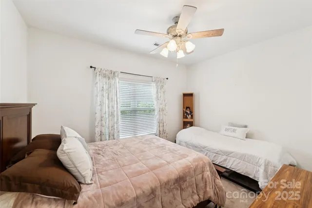 a room with furniture and flat screen tv